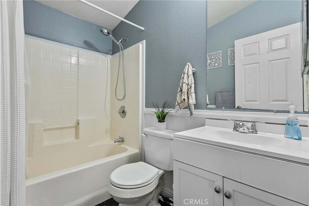 30000 Hasley Canyon Road, Unit 88 Castaic, CA 91384 - Photo 24 of 33 a bathroom with a sink a toilet and shower