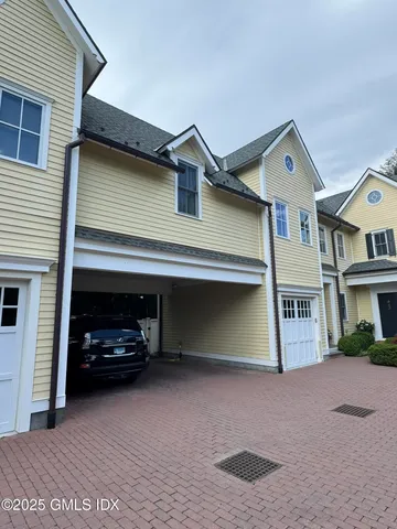 a car parked in front of a house