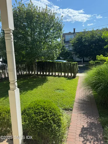 a view of a golf club with a yard