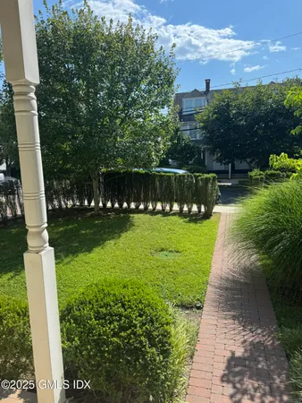a view of a golf club with a yard