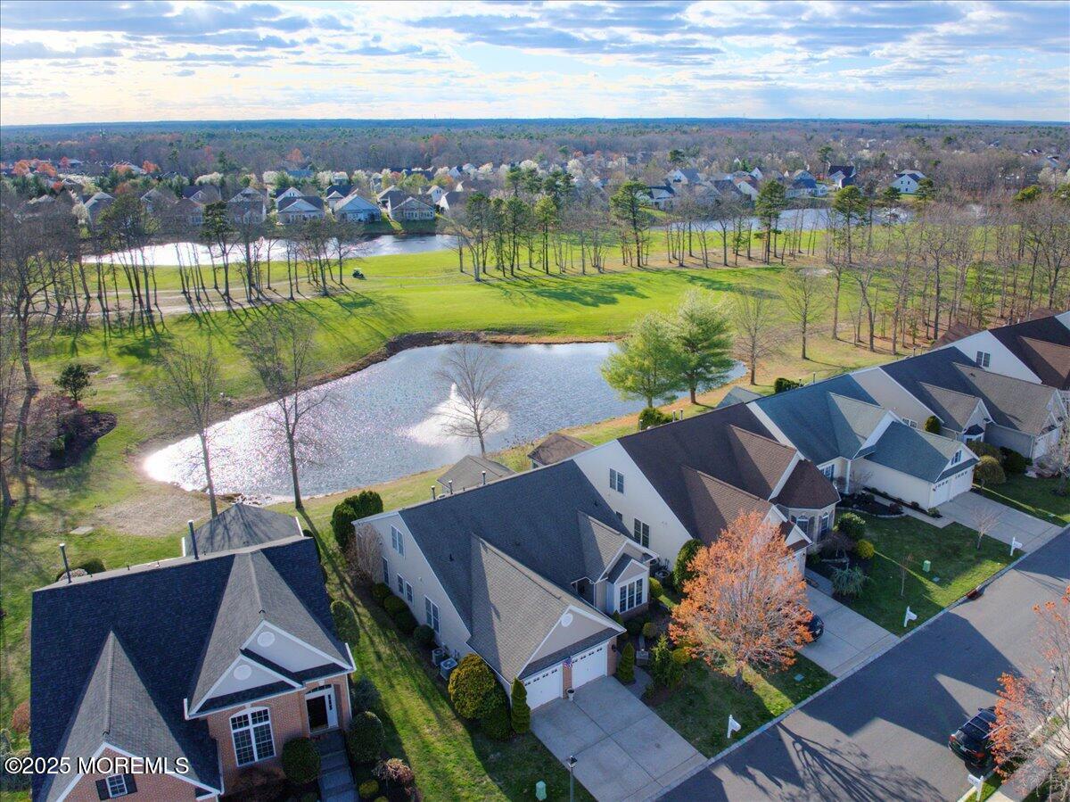36 Sawgrass Street Jackson, NJ 08527 - Photo 47 of 65 an aerial view of a house with a garden and lake view