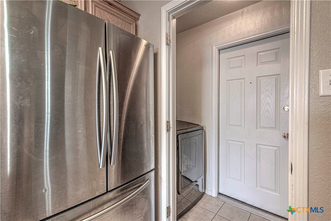 5004 Sunrise Street Killeen, TX 76542 - Photo 12 of 29 a view of a refrigerator in kitchen