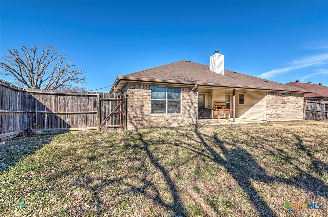5004 Sunrise Street Killeen, TX 76542 - Photo 26 of 29 a front view of a house with a yard