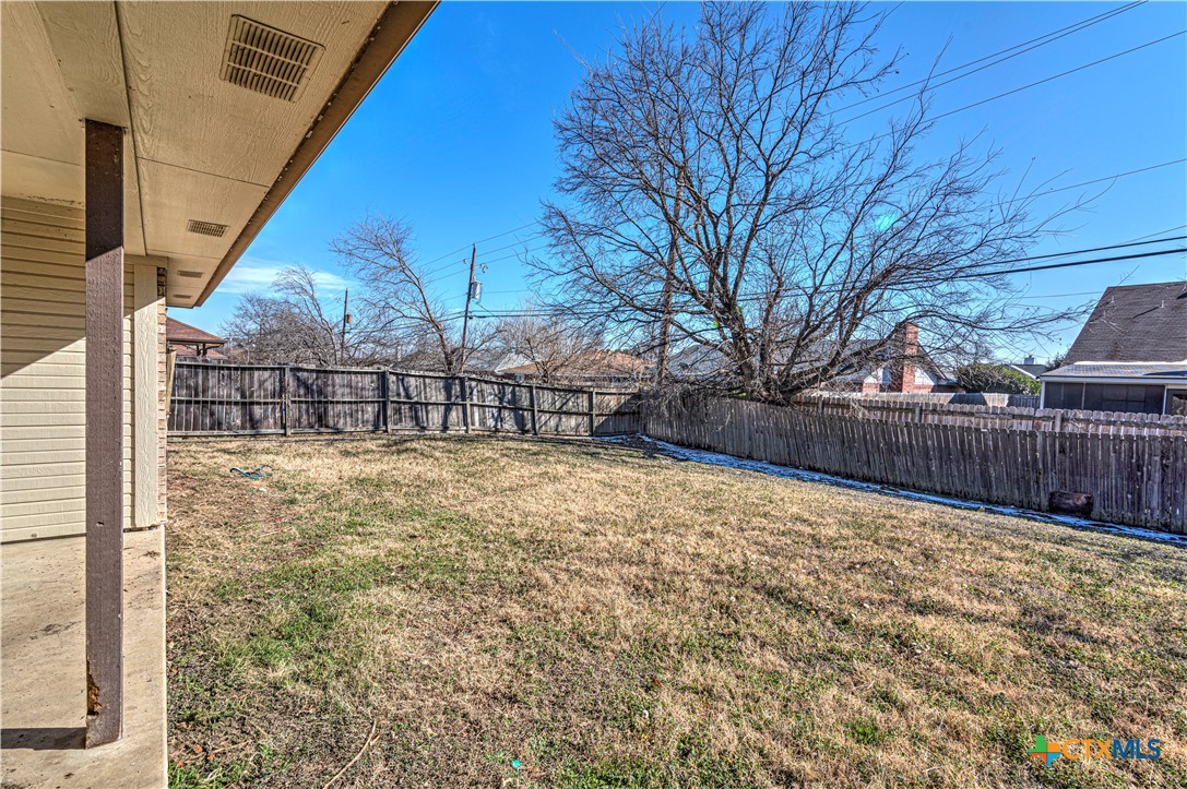 5004 Sunrise Street Killeen, TX 76542 - Photo 29 of 29 a view of backyard with wooden fence