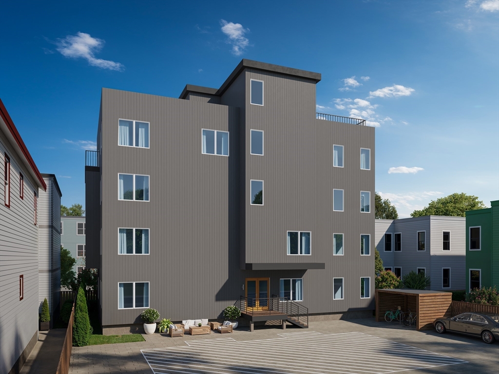 a front view of building with yard