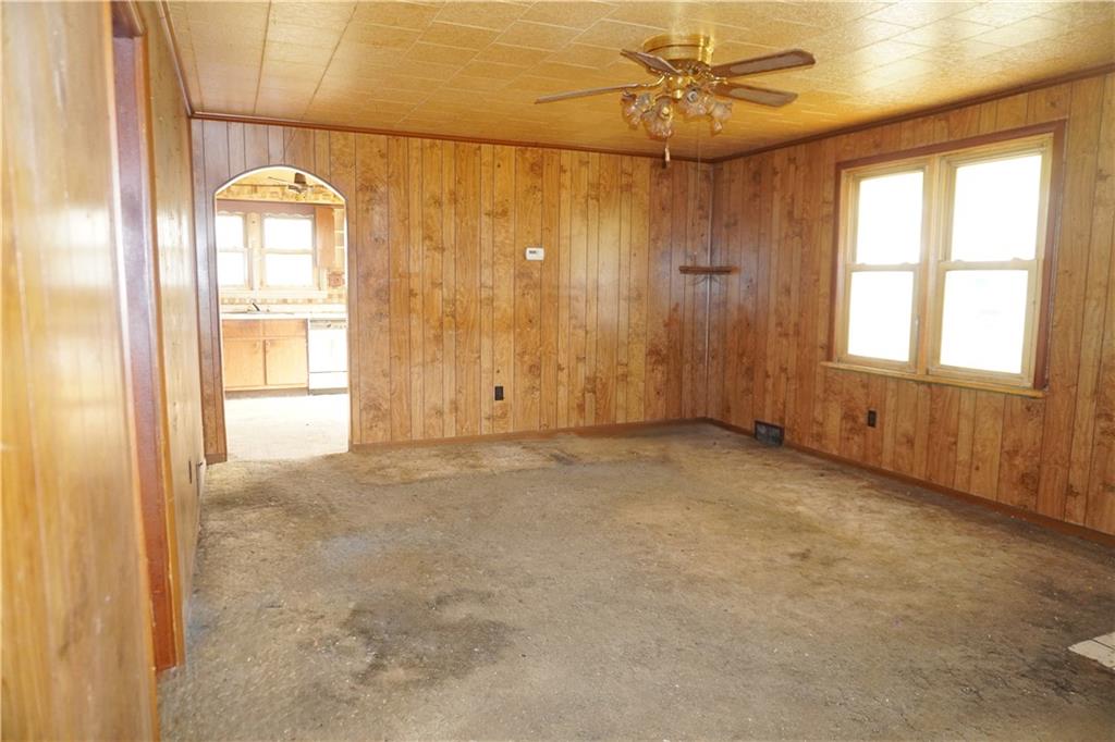 920 Collinsburg Road West Newton, PA 15089 - Photo 9 of 19 an empty room with chandelier fan and windows