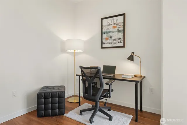 a view of workspace with lounge chair