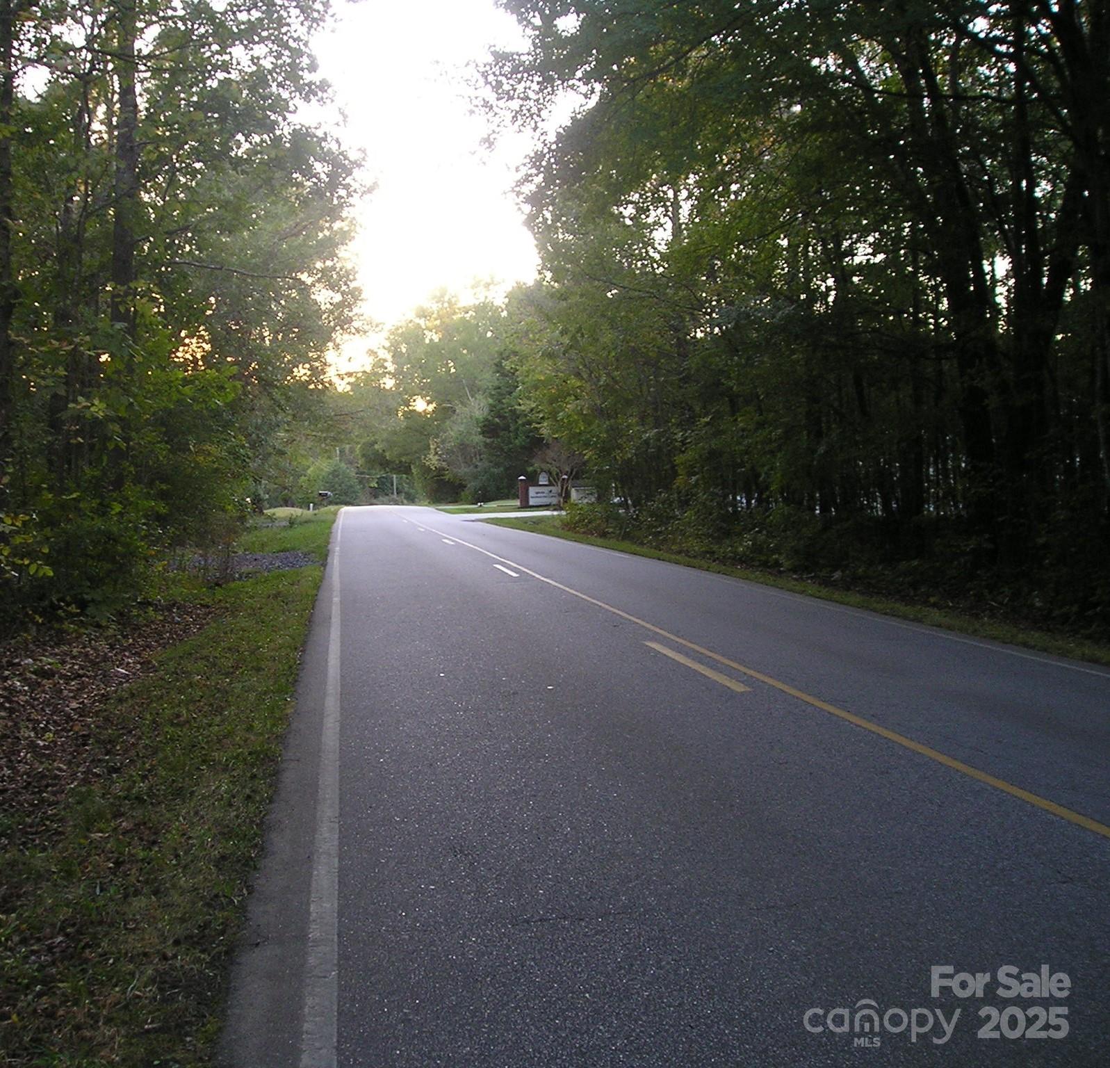 0 Old Monroe Marshville Road Wingate, NC 28174 - Photo 6 of 8 a view of a field with trees in background