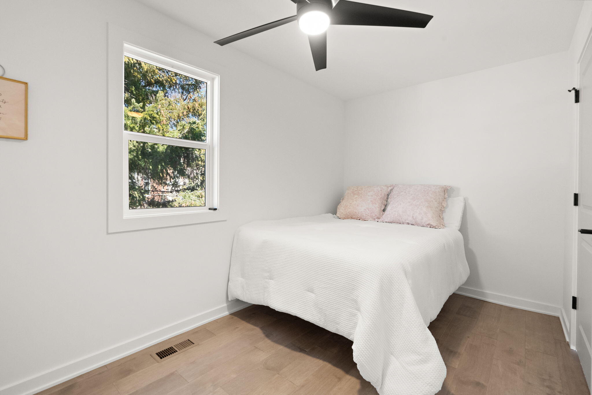 2017 Clark Street Whiting, IN 46394 - Photo 12 of 37 a bedroom with a bed and a window