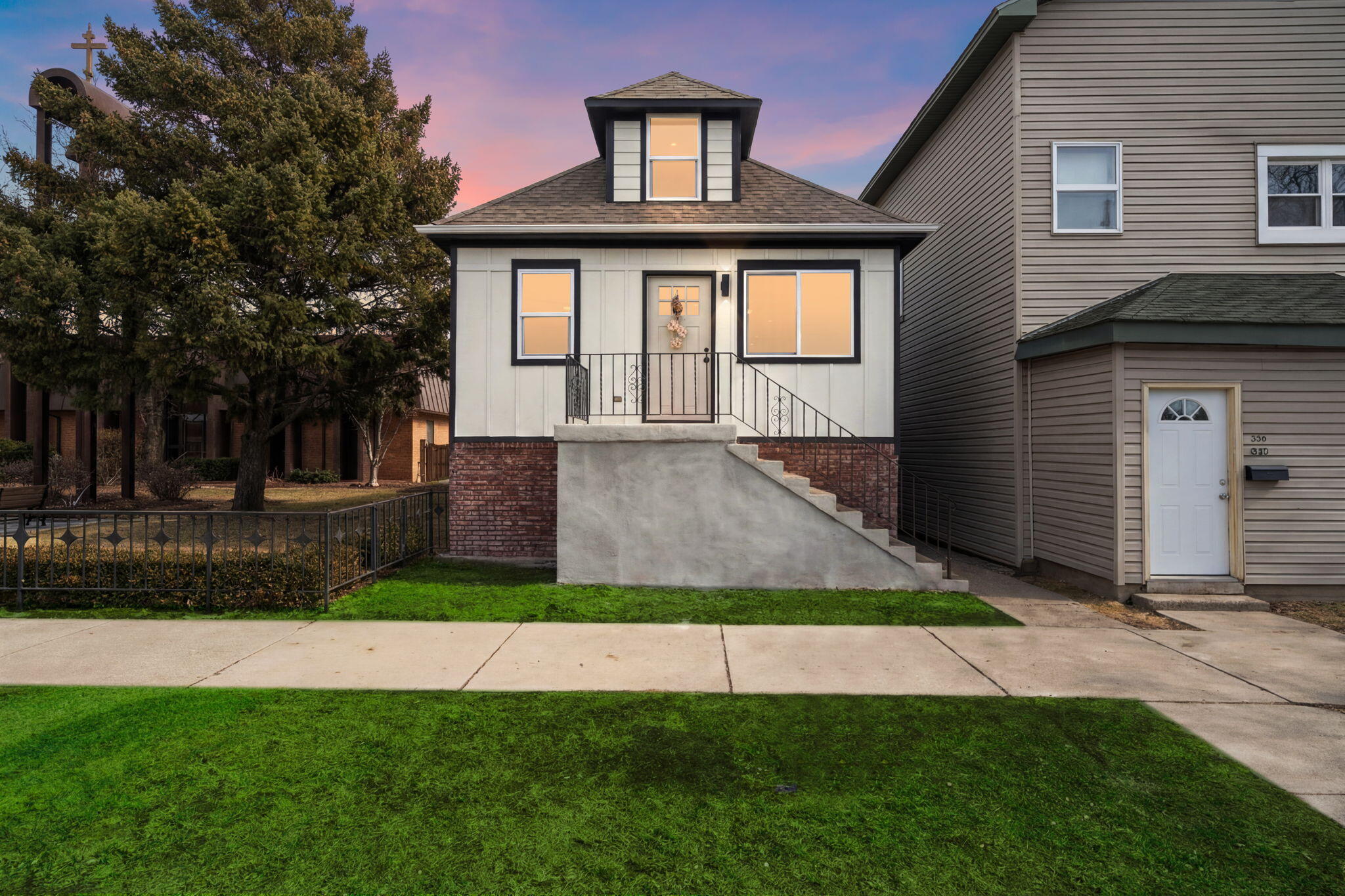 2017 Clark Street Whiting, IN 46394 - Photo 2 of 37 a front view of a house with a yard
