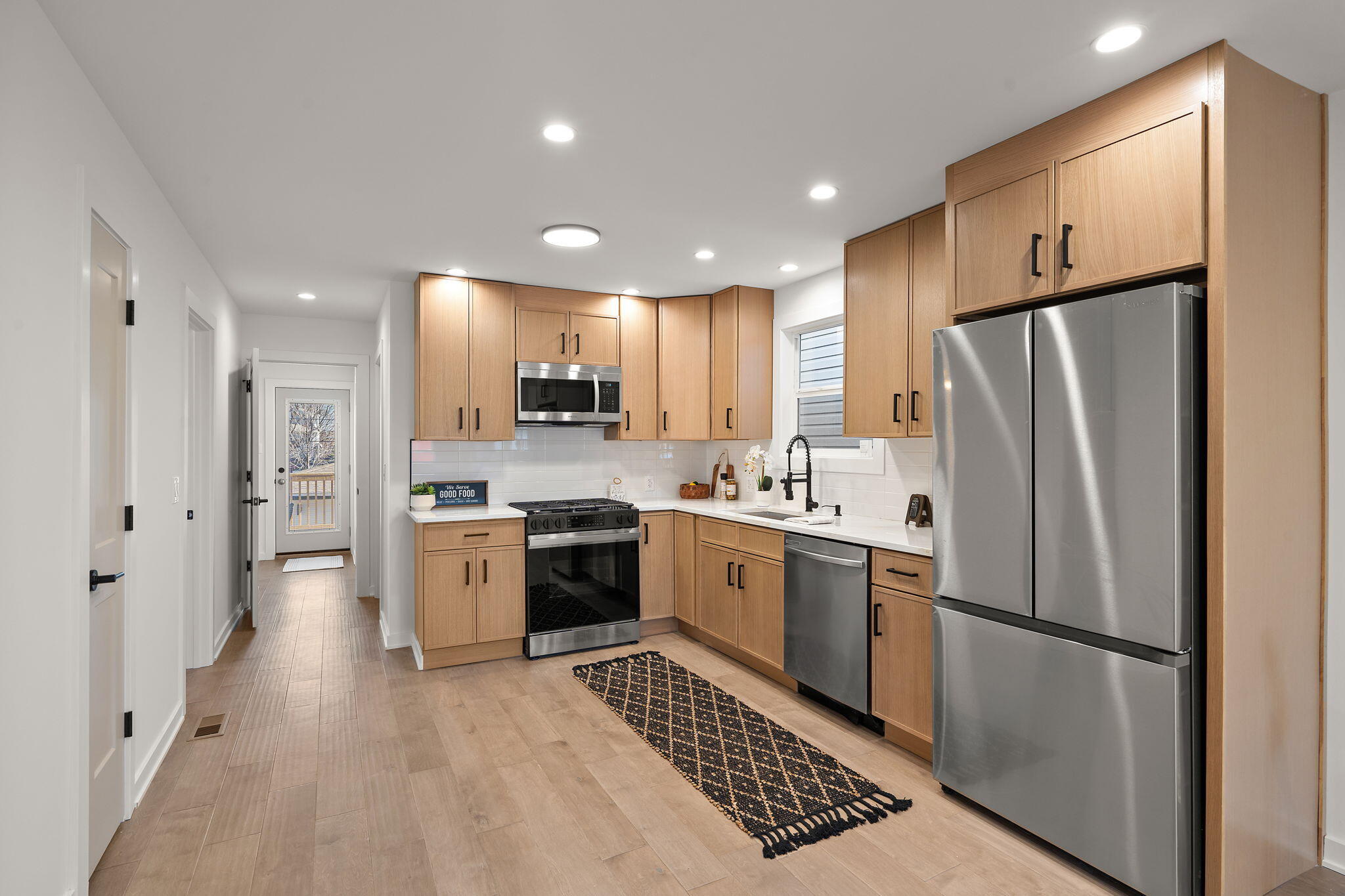 2017 Clark Street Whiting, IN 46394 - Photo 7 of 37 a kitchen with stainless steel appliances a refrigerator sink and stove