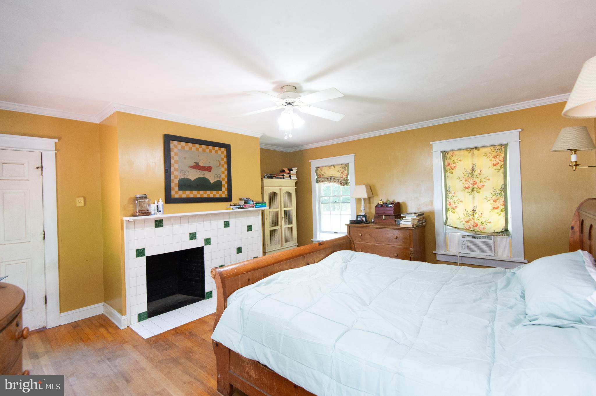 23130 Sparks Road Ridgely, MD 21660 - Photo 37 of 74 a large bedroom with a bed and a flat screen tv