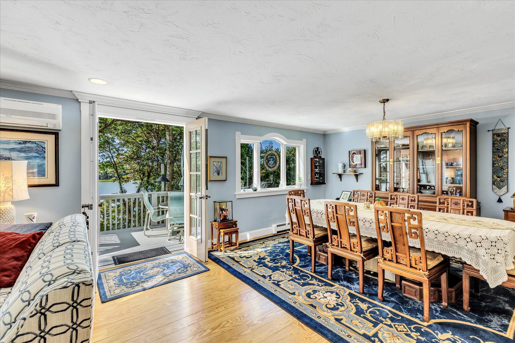 248 Wheeler Road Mashpee, MA 02649 - Photo 16 of 76 a living room with furniture and a large window