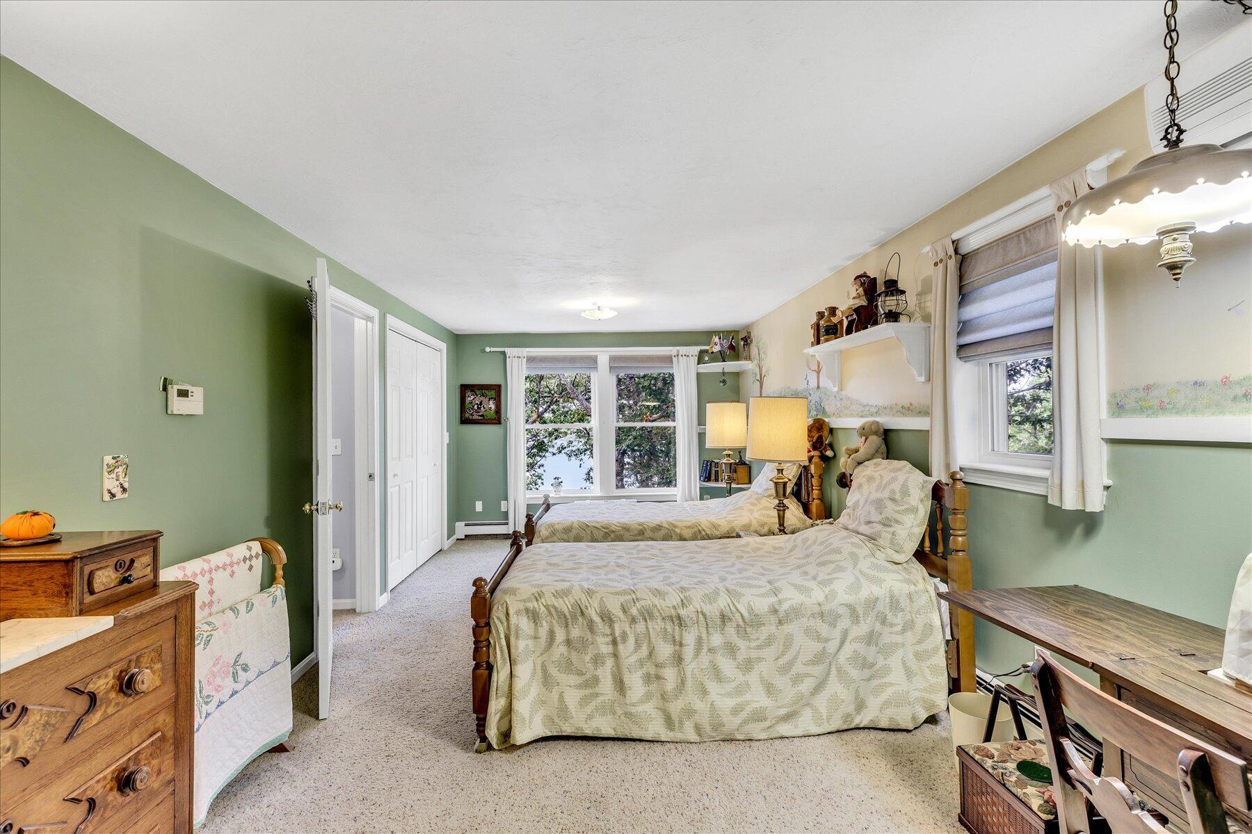 248 Wheeler Road Mashpee, MA 02649 - Photo 32 of 76 a bedroom with a bed dresser and a window