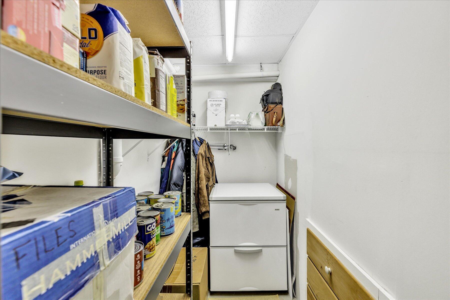 248 Wheeler Road Mashpee, MA 02649 - Photo 48 of 76 a view of walk in closet with clothes and shoes