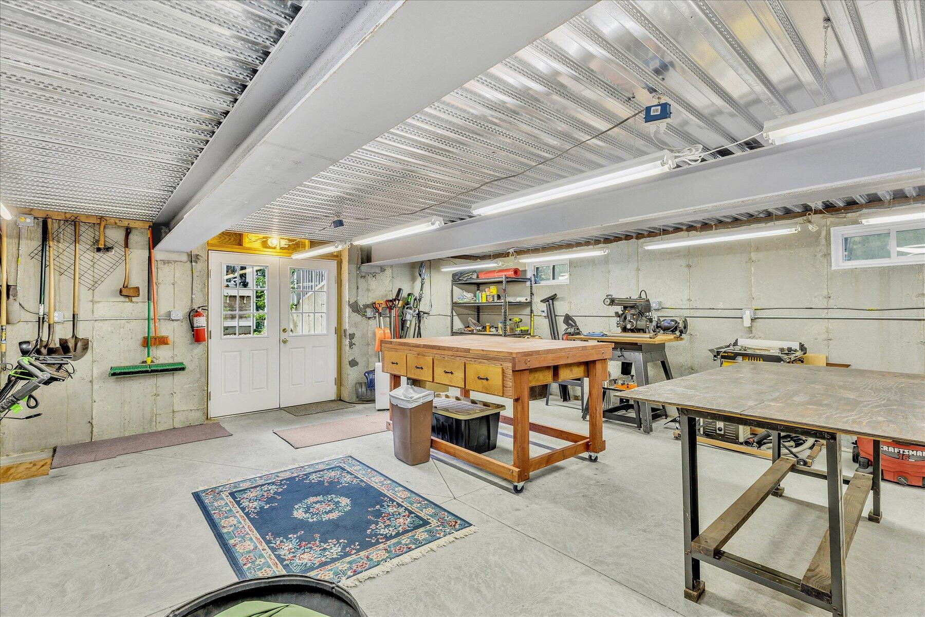 248 Wheeler Road Mashpee, MA 02649 - Photo 54 of 76 a utility room with furniture and a table