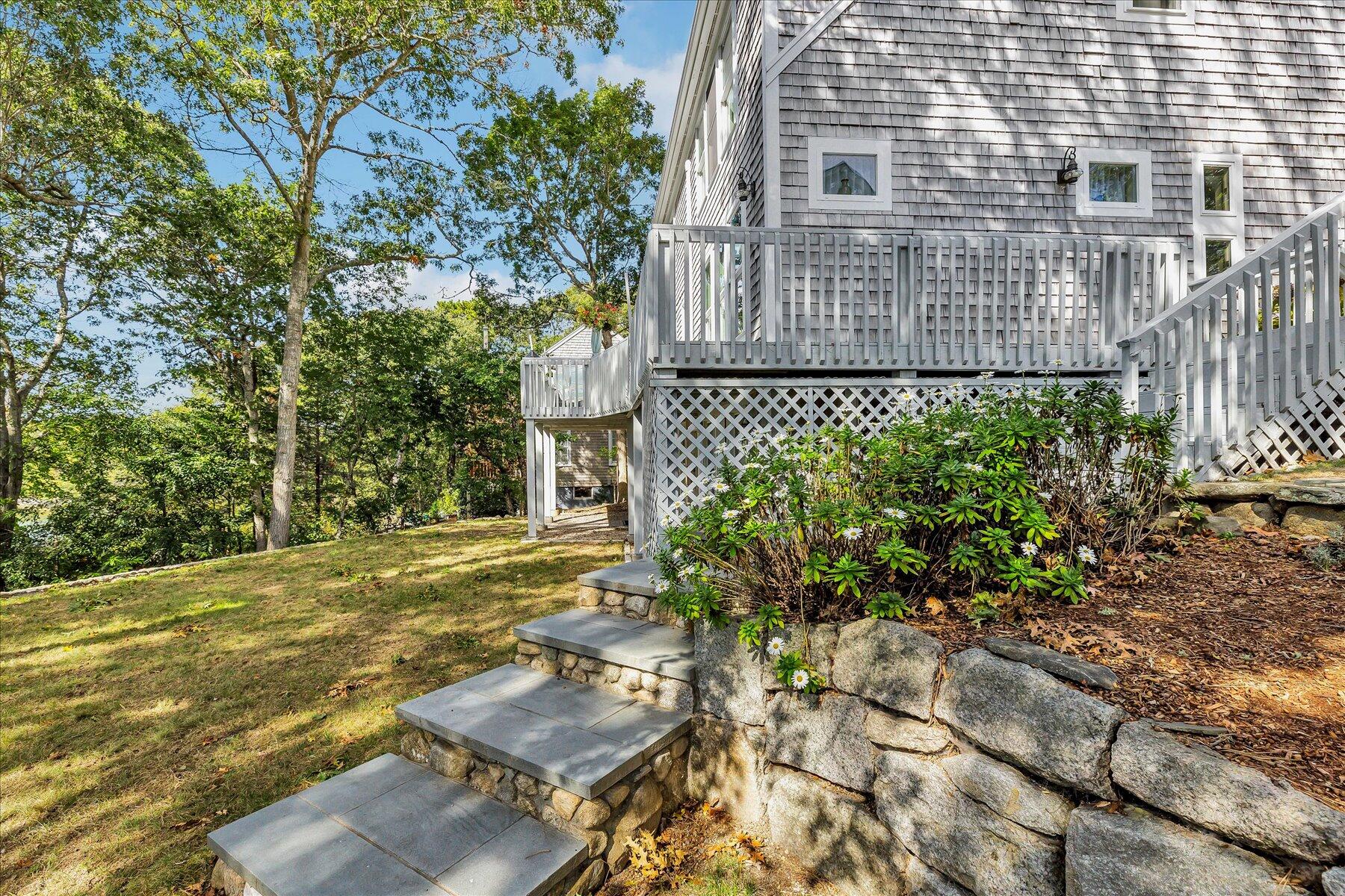 248 Wheeler Road Mashpee, MA 02649 - Photo 56 of 76 a view of a house with a yard