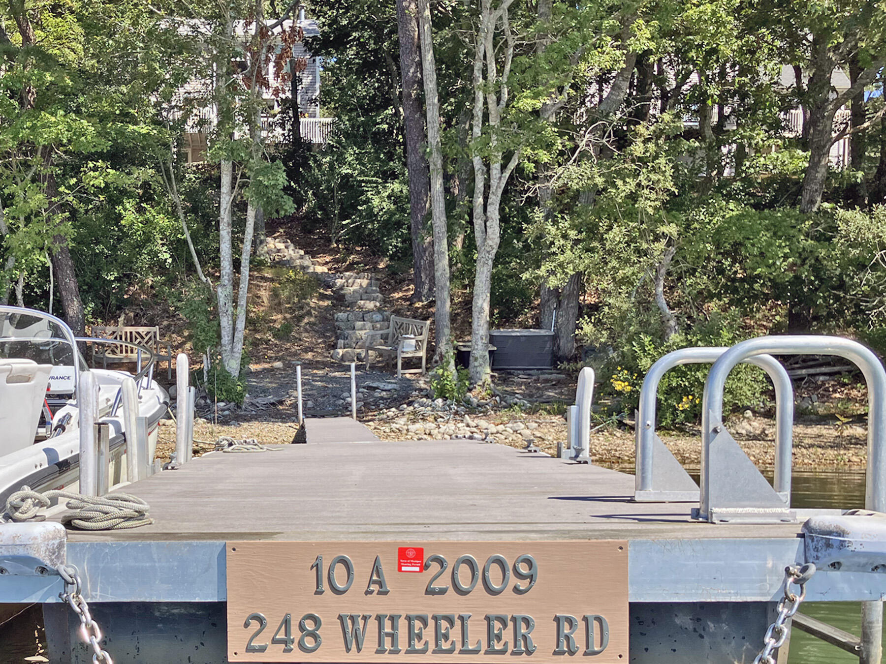 248 Wheeler Road Mashpee, MA 02649 - Photo 63 of 76 2024-09-03 Dock, swim ladder, w name boa