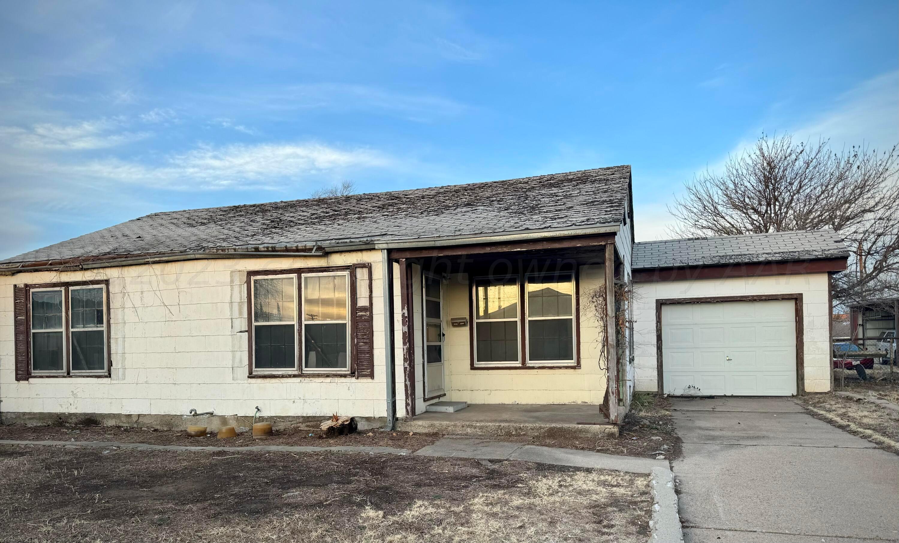 1303 Boyd Street Borger, TX 79007 - Photo 1 of 9 a front view of a house