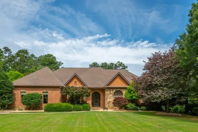 front view of a house with a yard