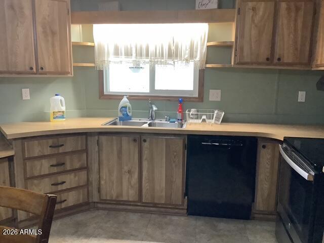 2605 South Tomahawk Road, Unit 10 Apache Junction, AZ 85119 - Photo 8 of 22 a kitchen with a sink and a window