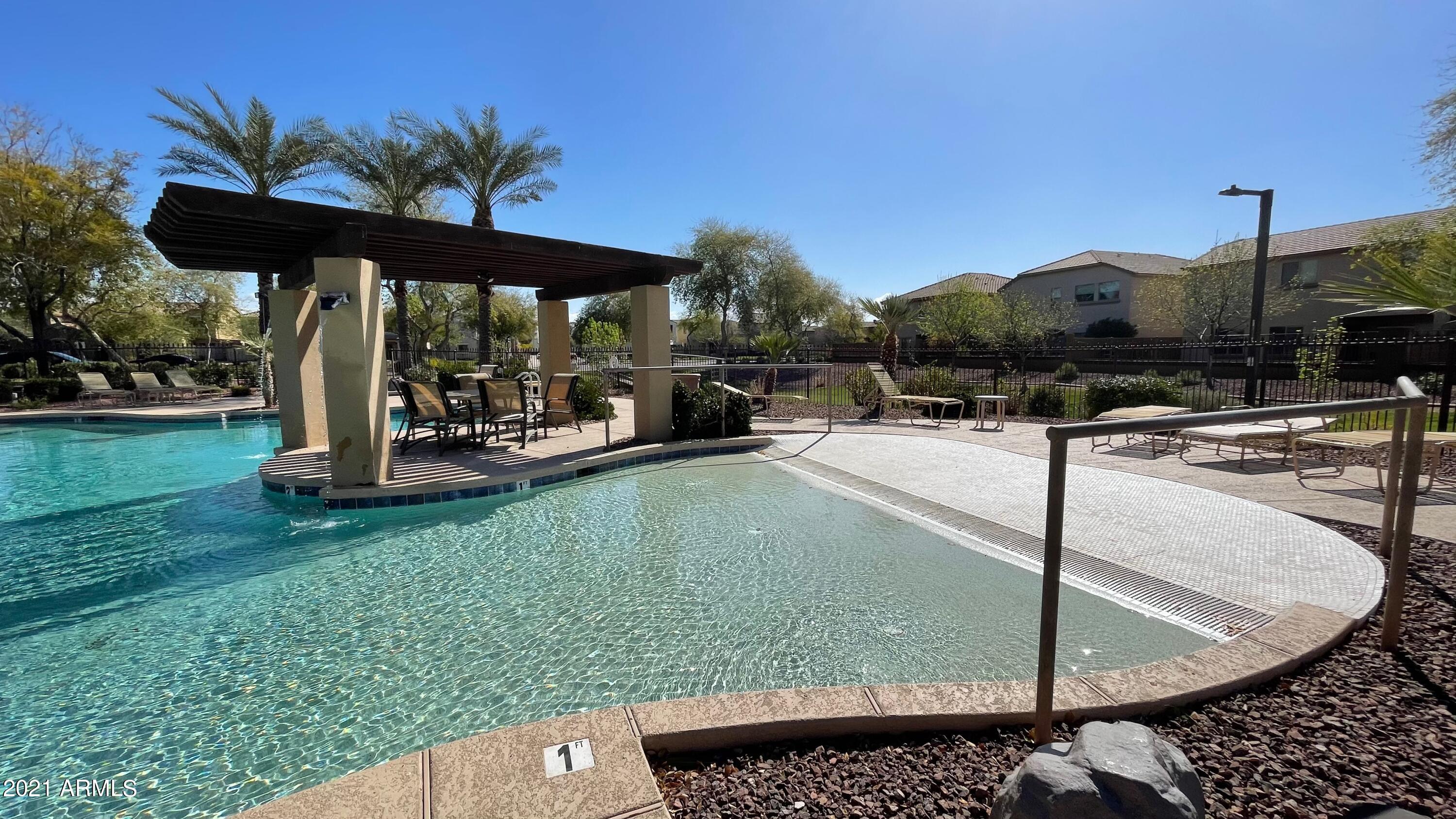 1941 West Davis Road Phoenix, AZ 85023 - Photo 21 of 24 a view of a swimming pool with a patio