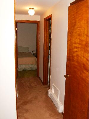 1672 Harding Road Northfield, IL 60093 - Photo 13 of 15 a view of a room that has a bed in it