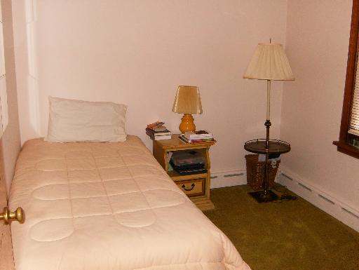 1672 Harding Road Northfield, IL 60093 - Photo 10 of 15 a bedroom with a bed and a table