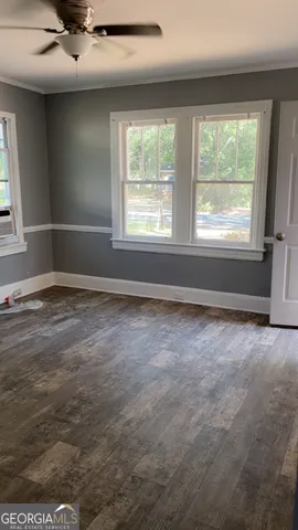 an empty room with windows