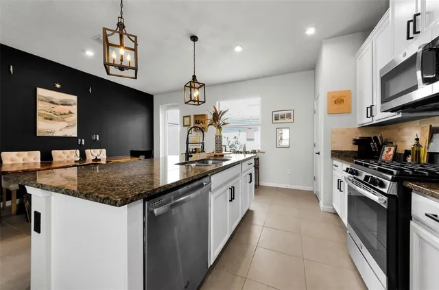 a workspace with furniture and window