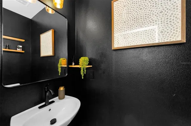 a bedroom with bed and window