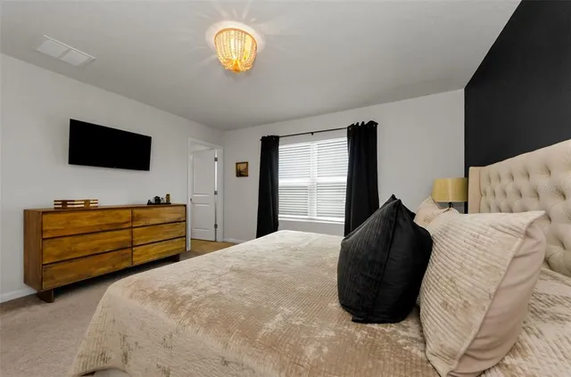 a room with a desk and a workspace