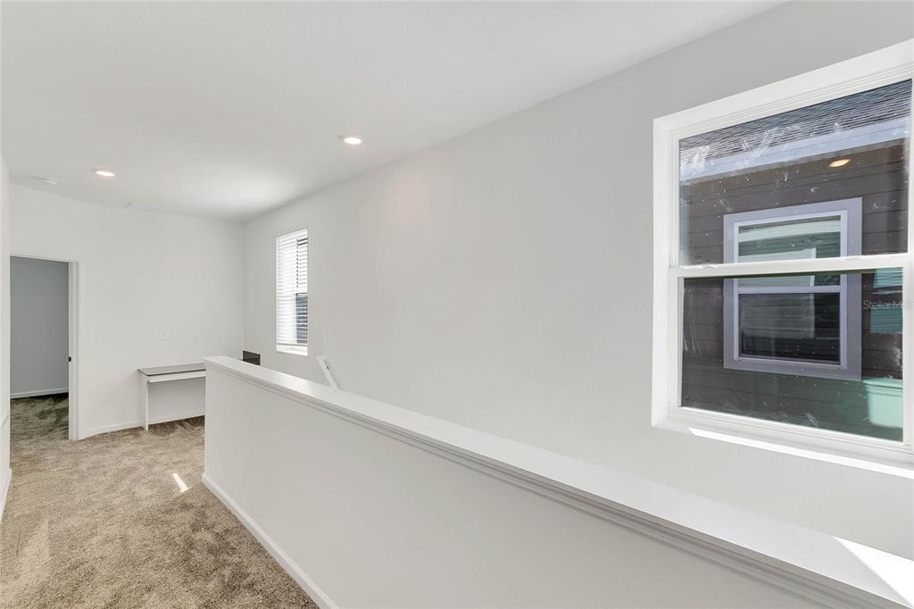 1721 Good Neighbor Loop Kissimmee, FL 34744 - Photo 16 of 28 a view of an empty room with a window