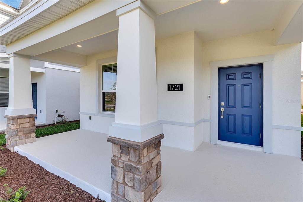 1721 Good Neighbor Loop Kissimmee, FL 34744 - Photo 2 of 28 a spacious bathroom with a sink and a mirror