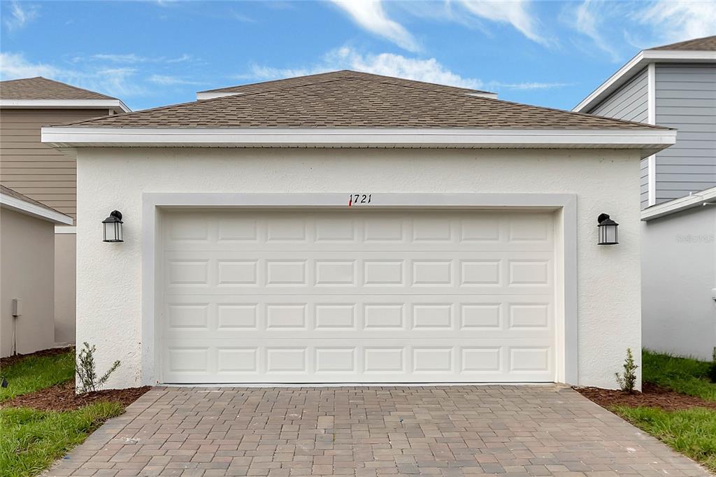 1721 Good Neighbor Loop Kissimmee, FL 34744 - Photo 27 of 28 a view of wooden door