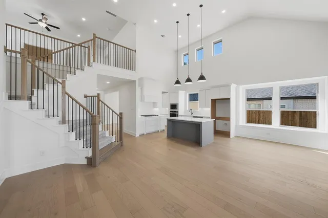 a view of kitchen with furniture and cabinets