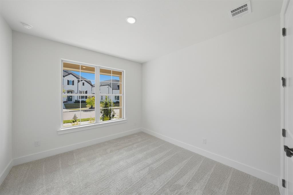 6028 Foxwheel Way Fort Worth, TX 76123 - Photo 3 of 37 Unfurnished room with carpet floors and recessed lighting