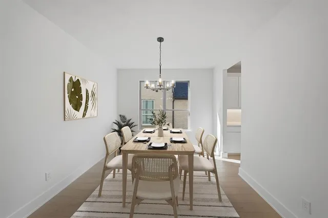 a bedroom with a bed and a potted plant