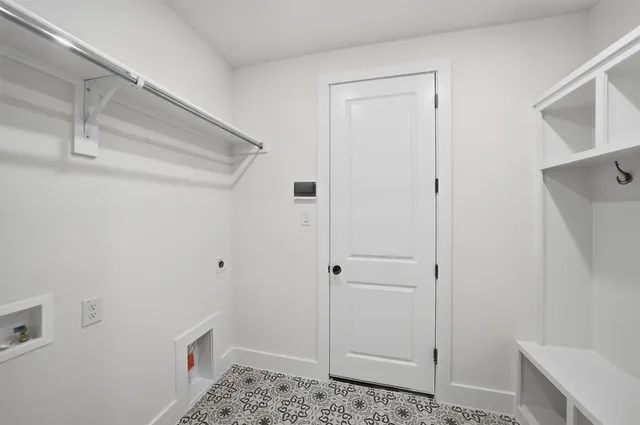 a room with cabinets and wooden floor