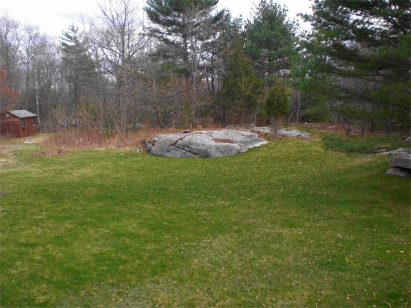 9 Bray Street Gloucester, MA 01930 - Photo 16 of 19 a backyard of a house with lots of green space