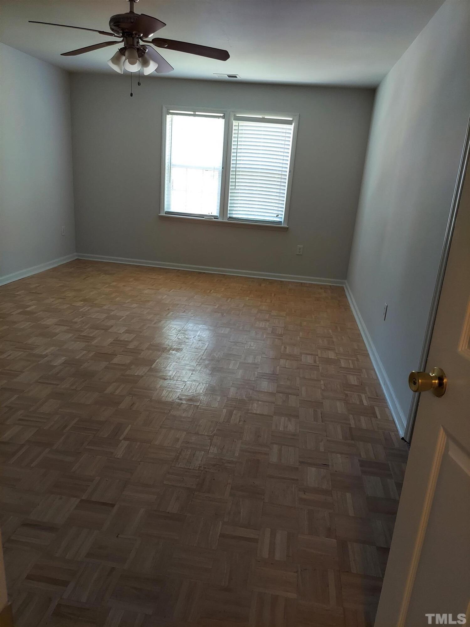 224 Crossfire Road Holly Springs, NC 27540 - Photo 30 of 43 en empty room with windows