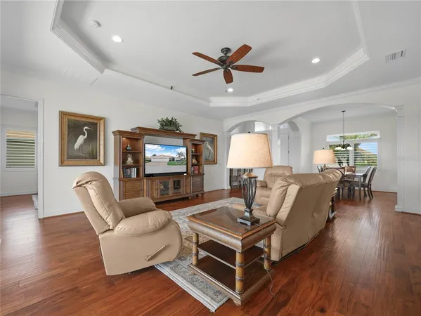 a view of a hallway with white walls and cabinet