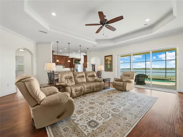 a bedroom with a bed and a night stand