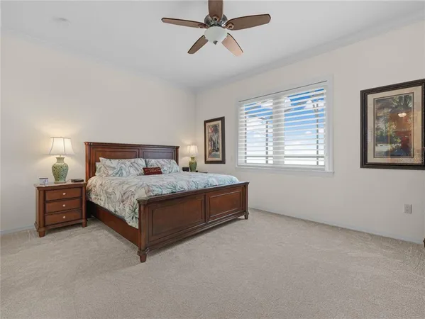 a bathroom with a granite countertop sink a mirror and a shower