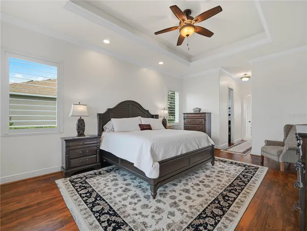 an aerial view of a houses with a yard