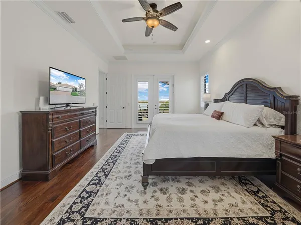 an aerial view of a house with a swimming pool yard and outdoor seating