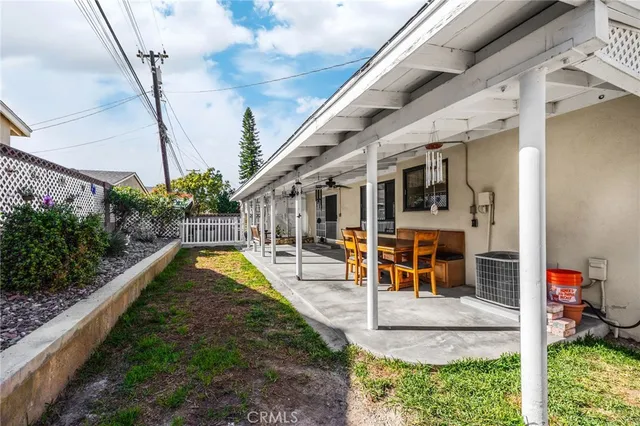 a view of house with a swimming pool