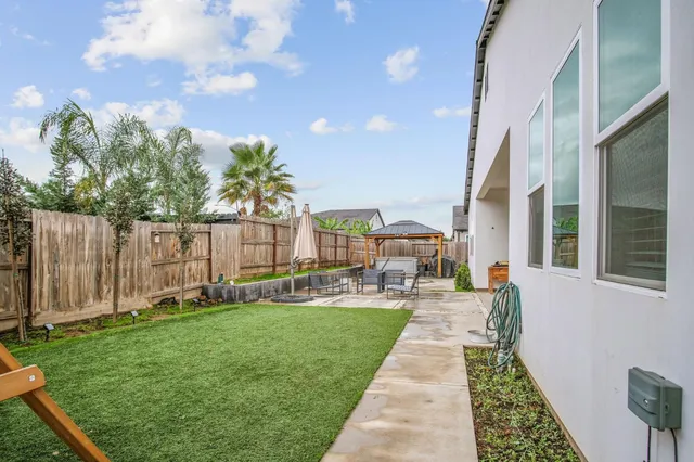 a house with garden in front of it