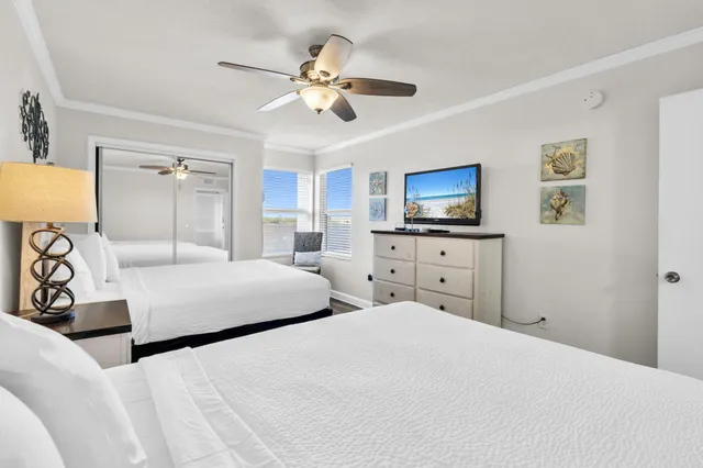 a view of a balcony with table and chairs