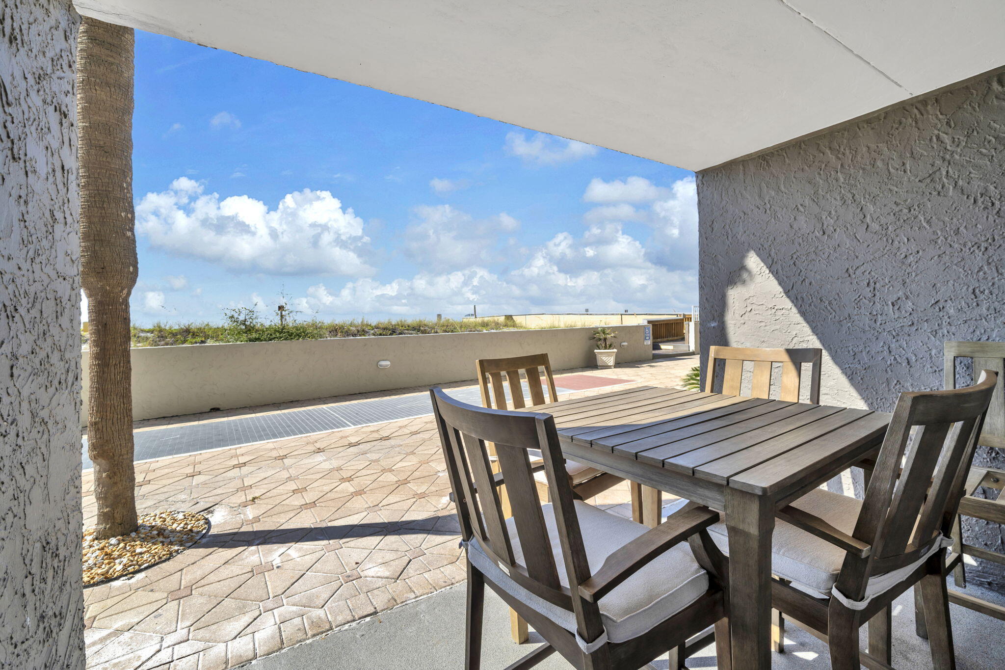 676 Santa Rosa Boulevard, Unit 1F Fort Walton Beach, FL 32548 - Photo 25 of 36 a view of a balcony with table and chairs